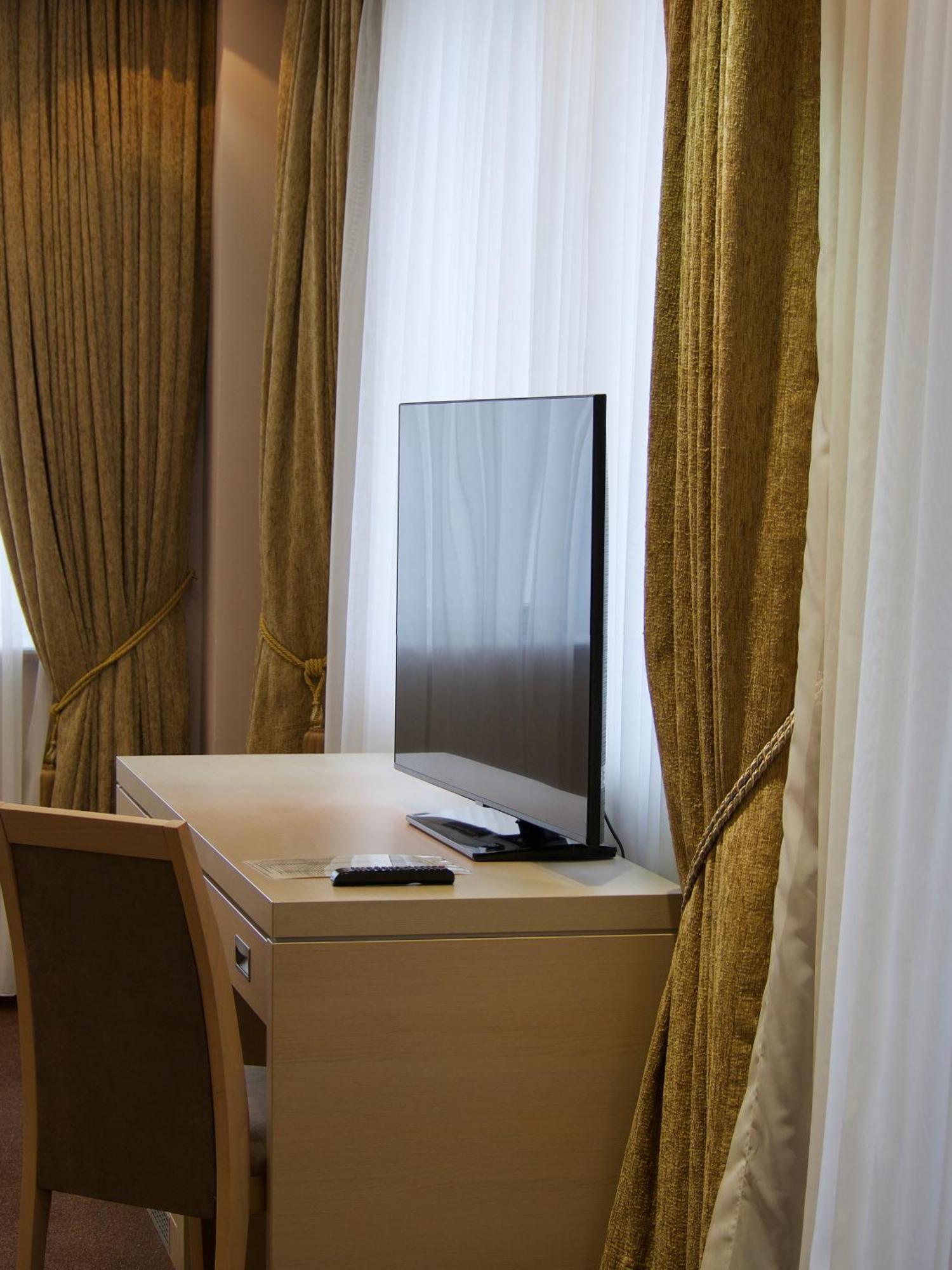 Caspian Riviera Grand Palace Hotel Aktau  Exterior photo A television set