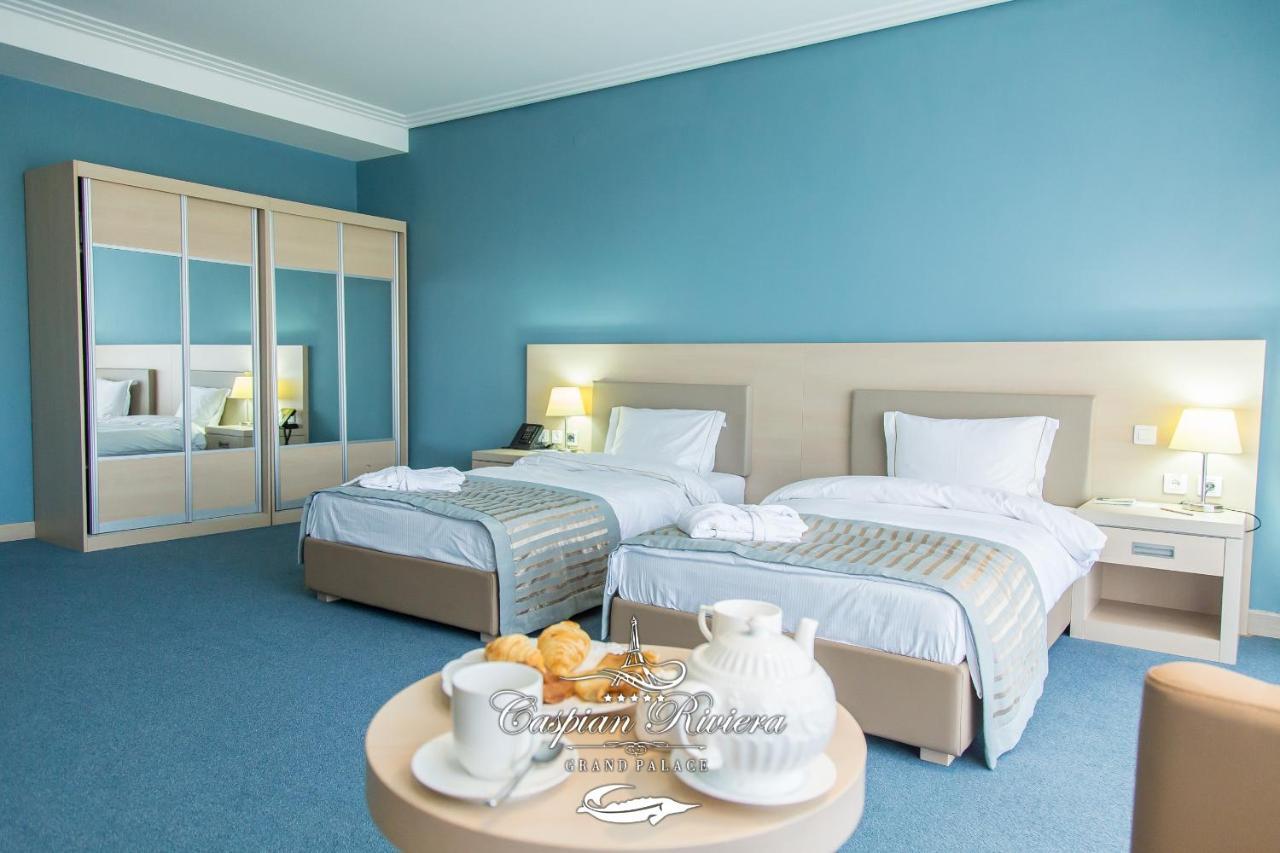 Caspian Riviera Grand Palace Hotel Aktau  Exterior photo A room at the hotel